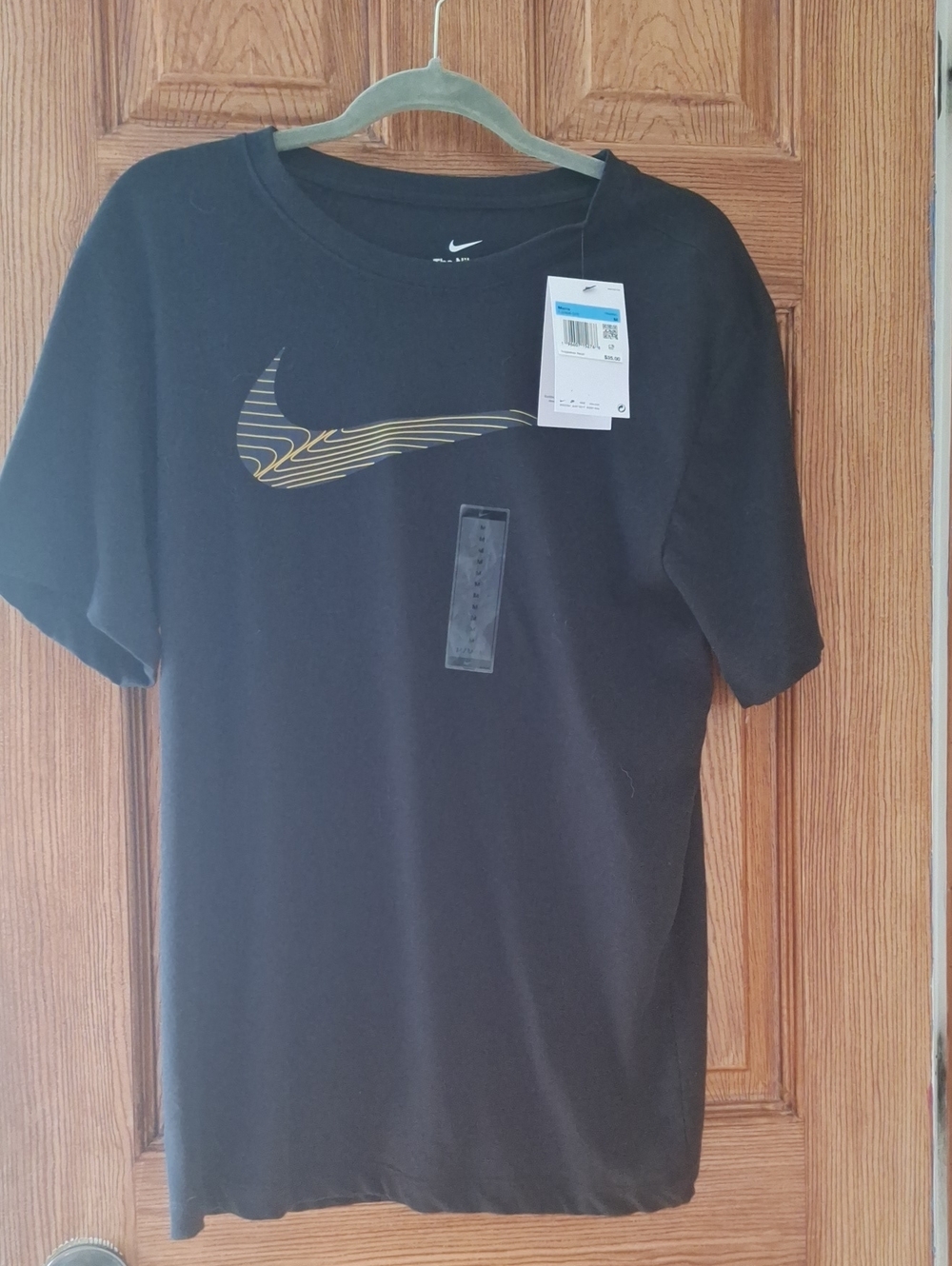 Nike Black Short-Sleeve Tee with Gold Swoosh